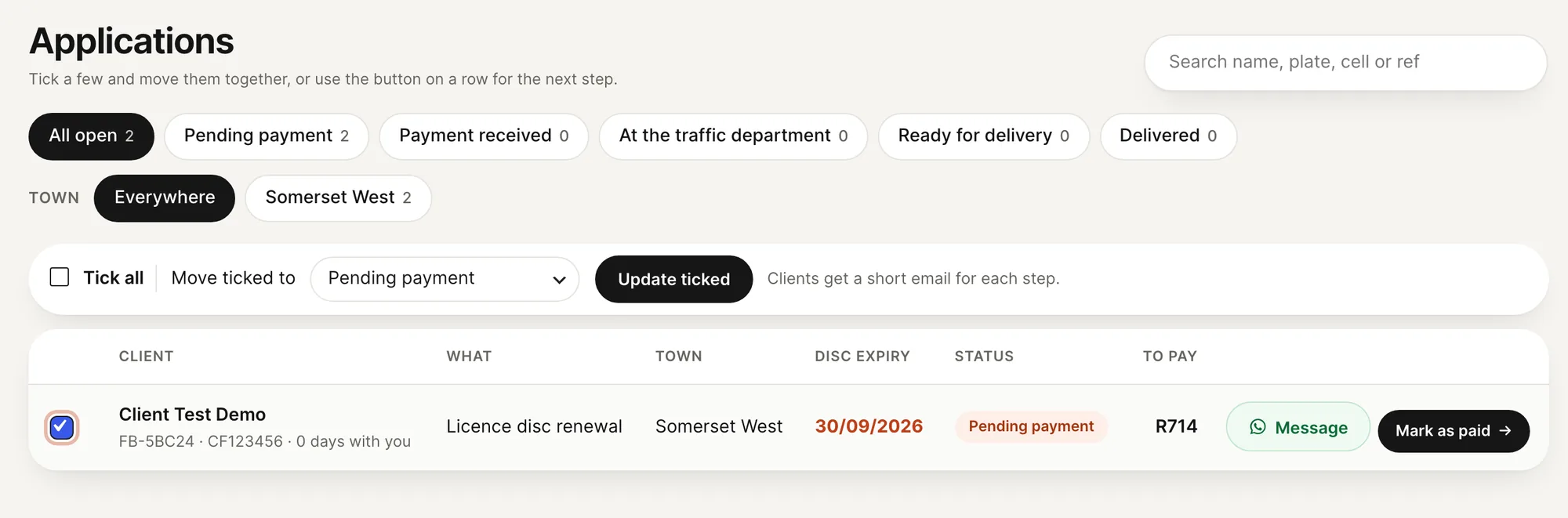 The applications list in Febe’s back office: status chips from All open to Delivered, town chips, a Tick all and Move ticked to bar, and the demo client’s row with a WhatsApp Message button and a Mark as paid button
